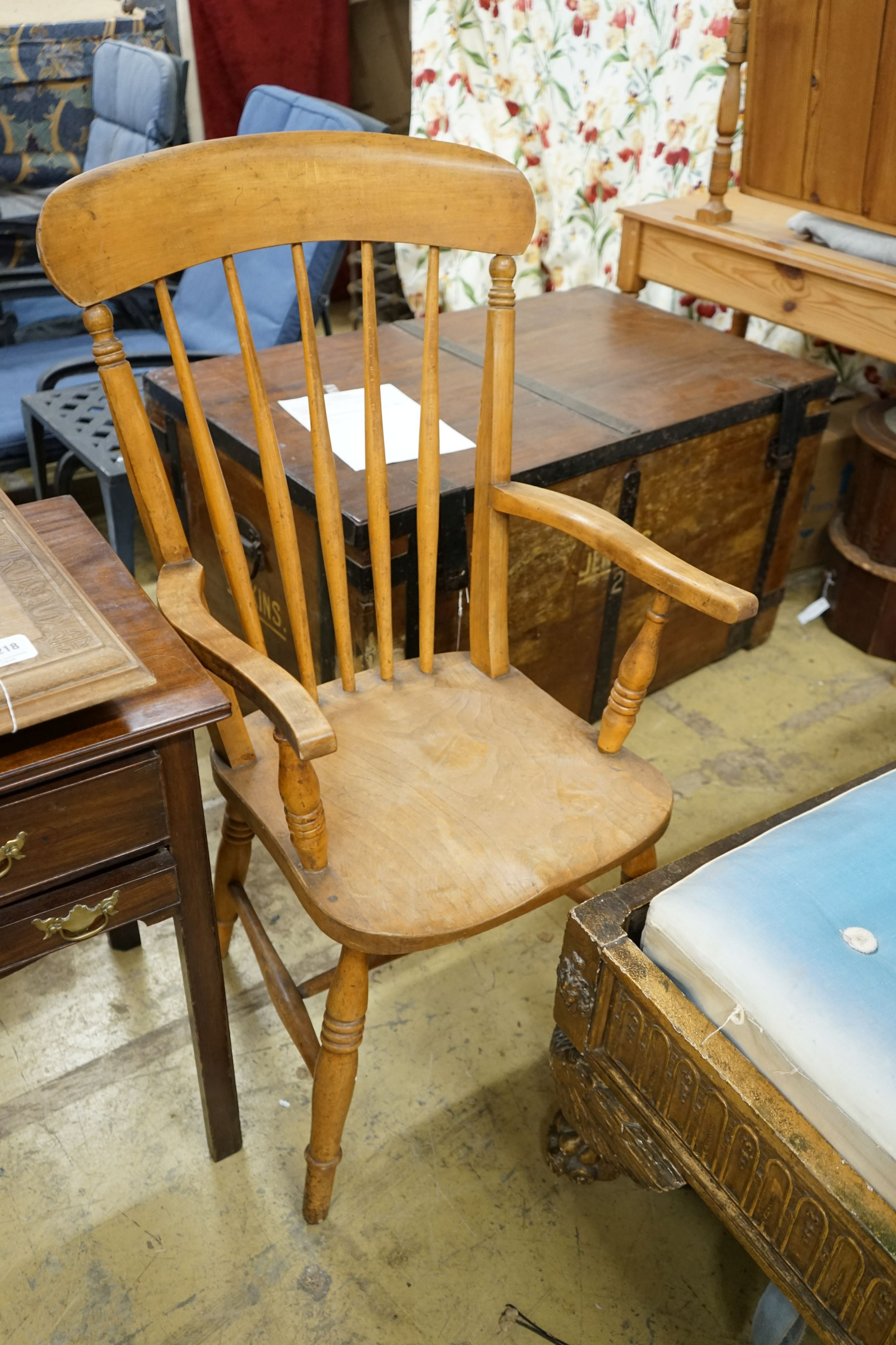 A pair of late Victorian elm and beech Windsor comb back armchairs, width 56cm, depth 47cm, height 112cm